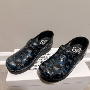 Sanita clogs with skulls.